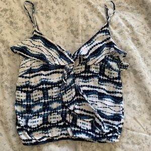 Blue/white cropped top.